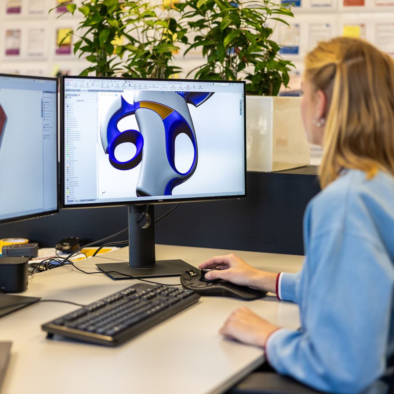 about us-engineer behind desk